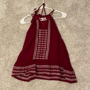 maroon tank top with stitched design